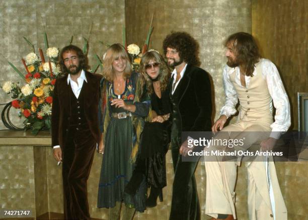 John McVie, Christine McVie, Stevie Nicks, Lindsey Buckingham and Mick Fleetwood of the rock group 'Fleetwood Mac' attend an event in circa 1977.