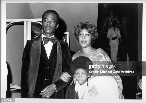 Soul singer Aretha Franklin attends an event with her husband actor Glynn Turman and her son Kecalf Franklin in circa 1979.