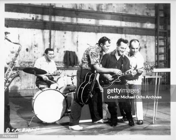 Bill Haley and His Comets perform in the Columbia Pictures film "Don't Knock the Rock" in 1956 in Los Angeles, California.