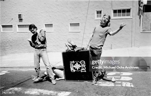 Phil Lesh, Bill Kreutzmann, Jerry Garcia, Bob Weir, Mickey Hart of the rock and roll band "The Grateful Dead" pose for a portrait in the middle of...