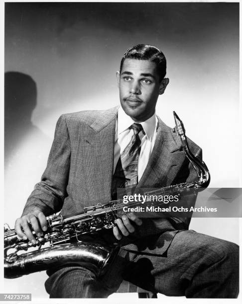 Musician Dexter Gordon poses for a portrait with his saxophone on July 12, 1947 in Los Angeles, California.