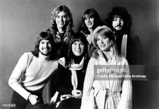 Roger Fisher, Howard Leese, Steve Fossen, Michael Derosier, Nancy Wilson, Ann Wilson of the rock band "Heart" pose for a portrait in circa 1977.