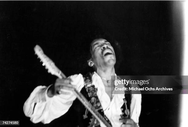 Jimi Hendrix performs onstage at the Monterey Pop Festival on June 18, 1967 in Monterey, California.