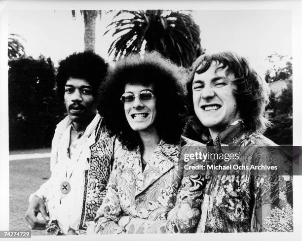 Rock band "The Jimi Hendrix Experience" pose for a portrait in 1968. Jimi Hendrix, Noel Redding, Mitch Mitchell.