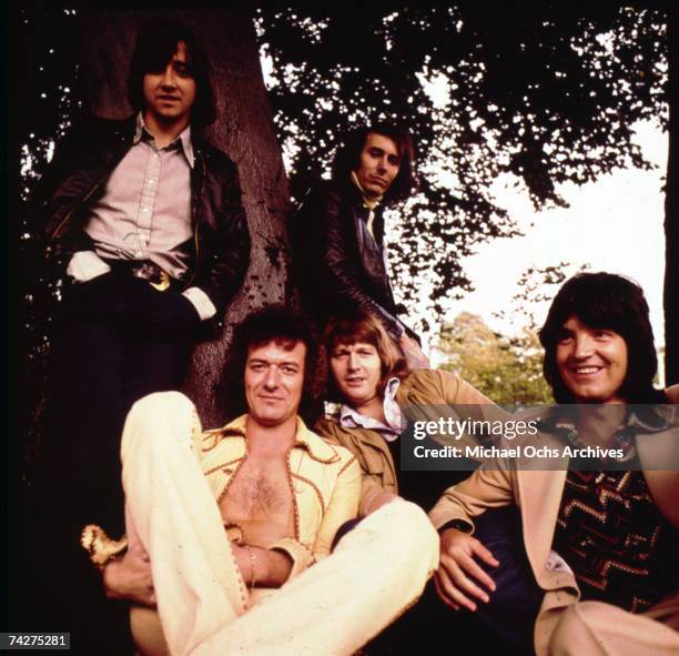 Tony Hicks, Bernie Calvert, Terry Sylvester, Bobby Elliott and Allan Clarke of the rock band "The Hollies" pose for a portrait in circa 1976.