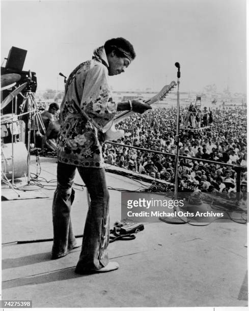 Rock guitarist Jimi Hendrix performs onstage in circa 1968.