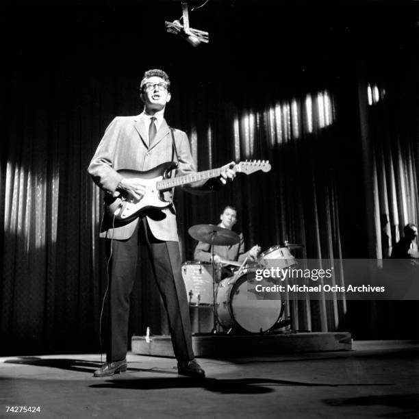 Buddy Holly & The Crickets L-R: Buddy Holly and Jerry Allison perform on the Ed Sullivan Show at the Ed Sullivan Theatre on January 26, 1958 in New...