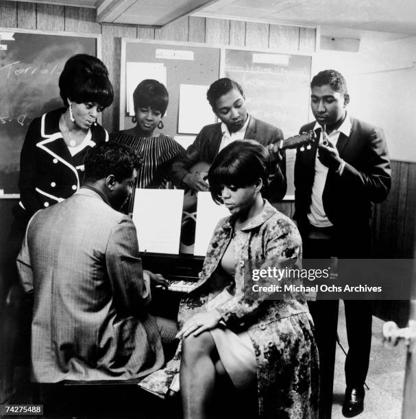 Diana Ross, Lamont Dozier , Mary Wilson, Eddie Holland, Florence Ballard (seated and Brian Holland in the Motown studio circa 1965 in Detroit,...