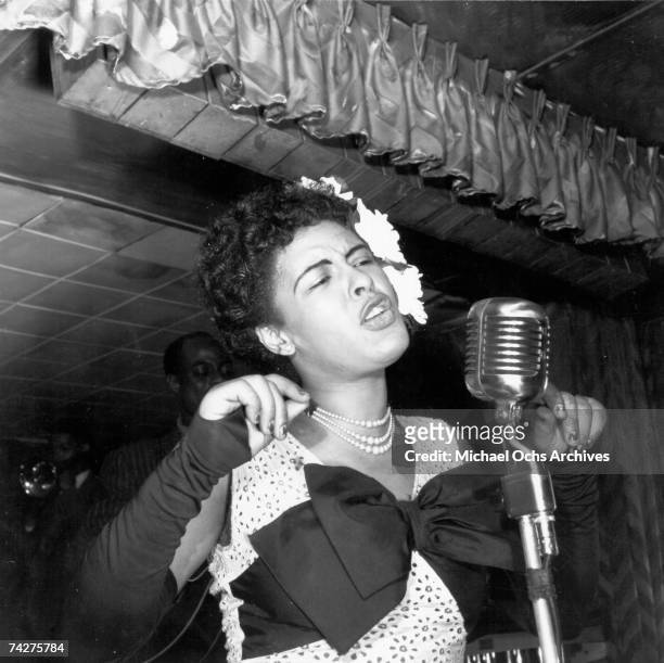 Jazz singer Billie Holiday performs at the Club Downbeat in February 1947 in New York City, New York.