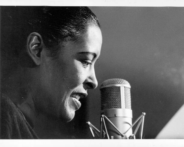 Jazz singer Billie Holiday rehearses for her performance on the TV show 'The Seven Lively Arts: The Sound Of Jazz' that aired on December 8 1957 in...