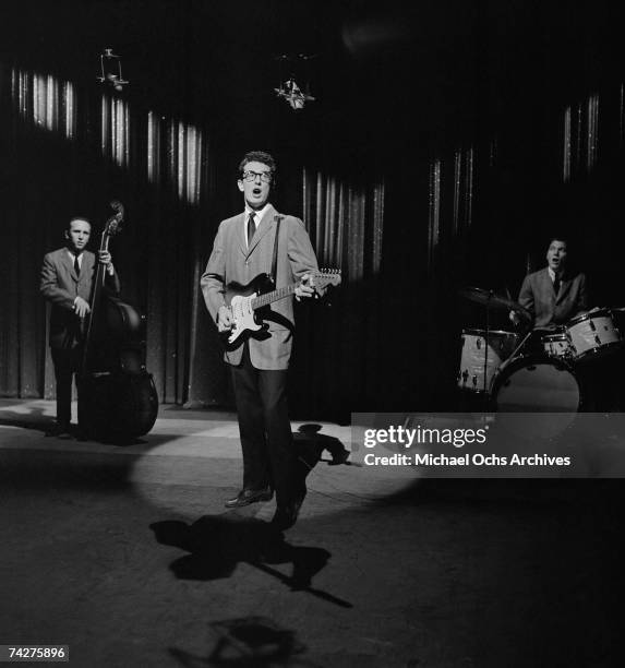 Buddy Holly & The Crickets L-R: Joe Mauldin, Buddy Holly, Jerry Allison perform on the Ed Sullivan Show at the Ed Sullivan Theatre on January 26,...