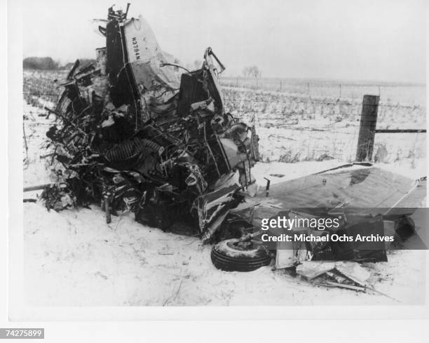 The wreckage of a Beechcraft Bonanza airplane in a snowy field outside of Clear Lake, Iowa, early February 1959. The crash, on February 3, claimed...