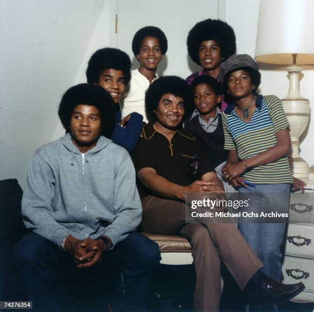 Quintet "Jackson 5" pose for a portrait with their youngest brother Randy and father Joe. Clockwise from bottom left: Jackie Jackson, Tito Jackson,...