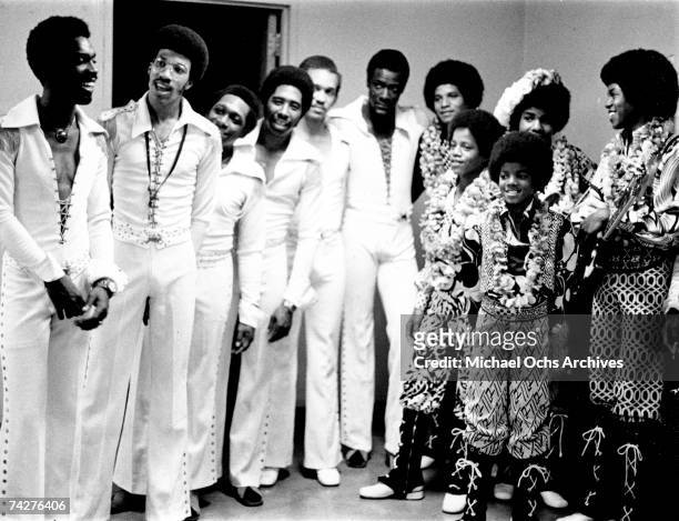 Quintet "Jackson 5" pose for a portrait bacsktage with fellow Motown Records R&B group "The Commodores" in circa 1974. Lionel Ritchie , Jackie...
