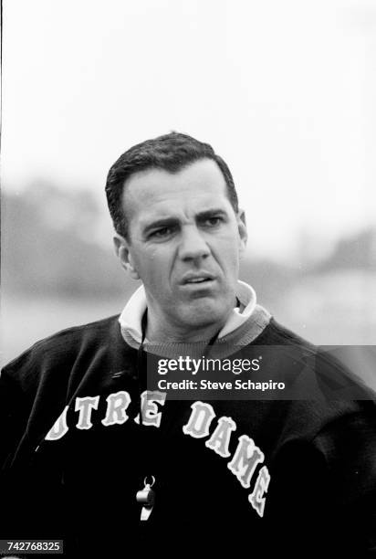 View of University of Notre Dame football coach Ara Parseghian as he conducts practice on the field, South Bend, Indiana, 1964.