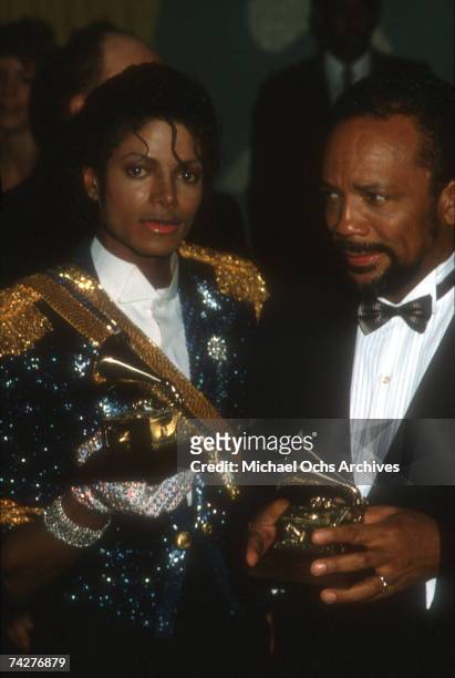 Pop singer Michael Jackson and producer Quincy Jones pose for a portrait after winning at the Grammys for their work on the album Thriller on...