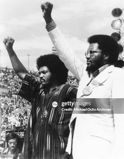 American political activist, Jesse Jackson giving a clenched fist salute at the Wattstax music festival, Los Angeles, California, 20th August 1972....