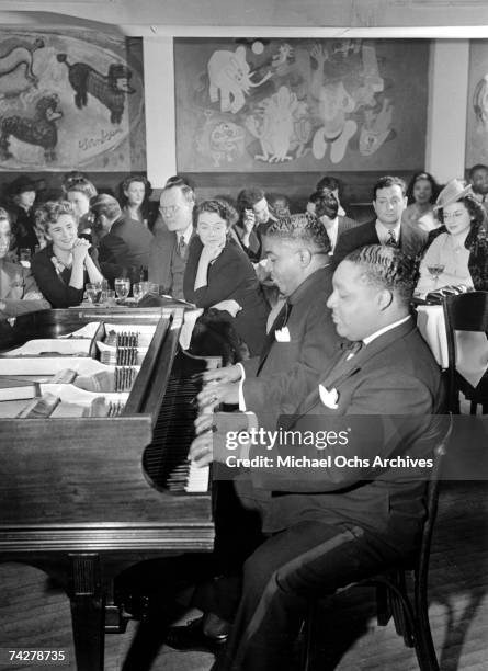 American pianists Pete Johnson and Albert Ammons performing, circa 1939. Photo by Michael Ochs Archives/Getty Images