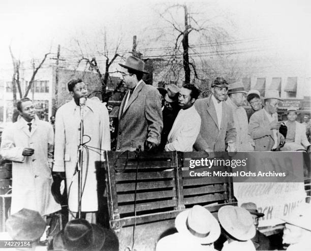 Blues musician B.B. King stands on the back of a truck with other African-American men to raise money for radio station WDIA's Wheelin' On Beale...