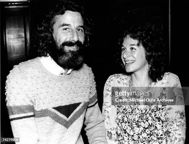 Producer Lou Adler and singer/songwriter Carole King pose for a portrait in circa 1973.