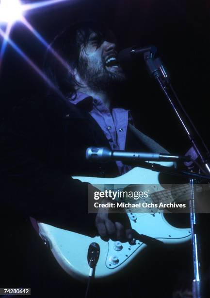 Singer and guitarist Lowell George of the rock and roll band "Little Feat" performs onstage in July 1974.