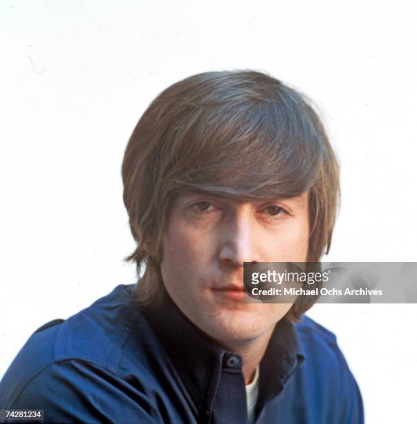 John Lennon of the rock and roll band "The Beatles" poses for a portrait in circa 1966.