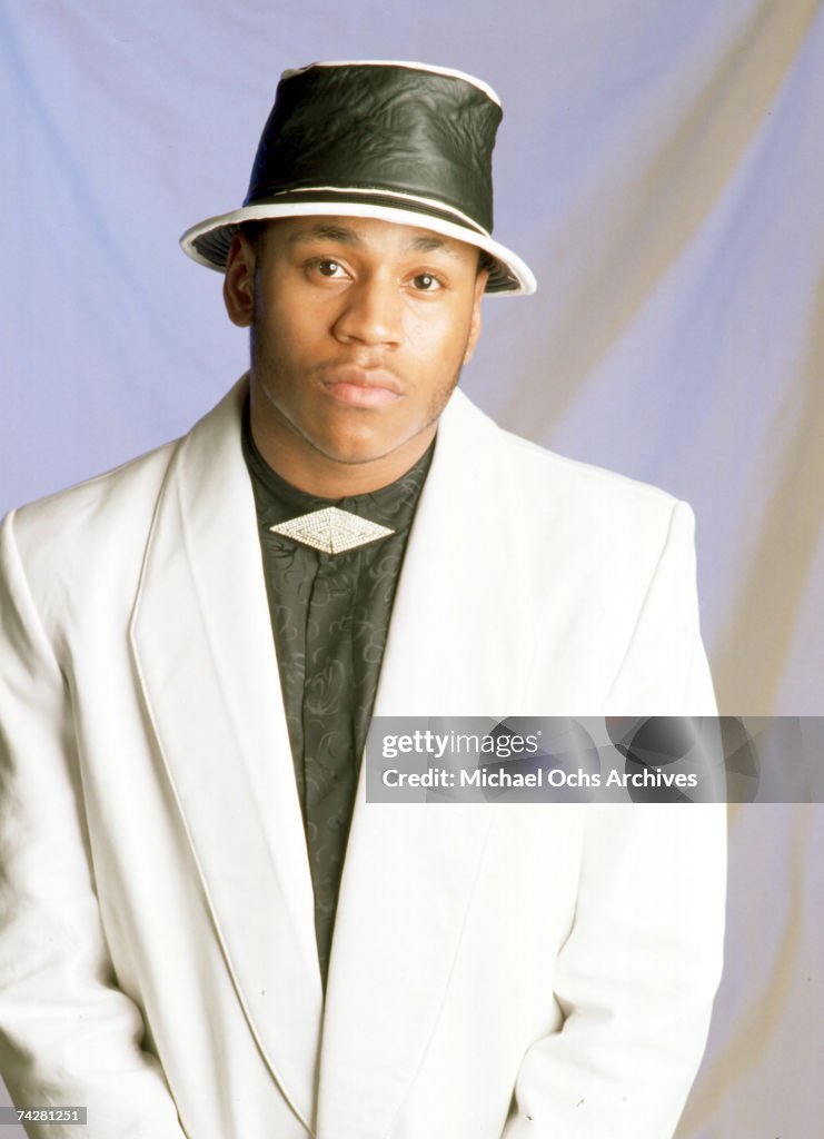Rapper LL Cool J poses for a portrait session wearing a suit and hat ...