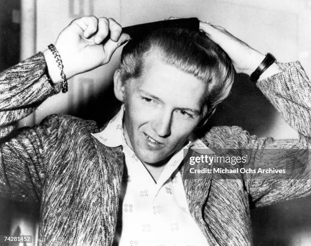 Rock and roll musician Jerry Lee Lewis performs circa 1960.