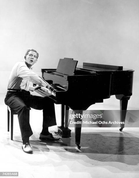 Rock and roll musician Jerry Lee Lewis performs on the set of the Warner Bros 1957 film "Jamboree".
