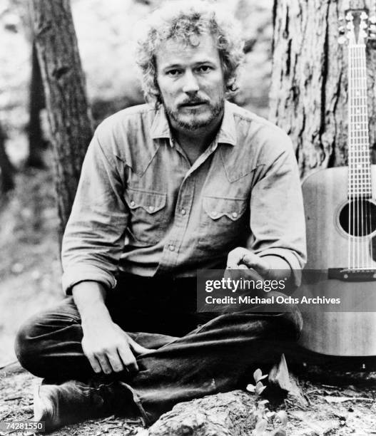 Canadian singer and songwriter Gordon Lightfoot poses for a publicity still to promote his album 'Sundown' on Reprise records.
