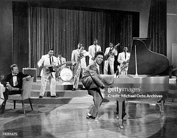 Musician Little Richard performs onstage with his band in 1956.