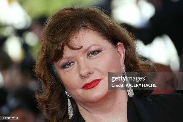 French actress Catherine Jacob poses 24 May 2007 upon arriving at the Festival Palace in Cannes, southern France, for the premiere of US director...