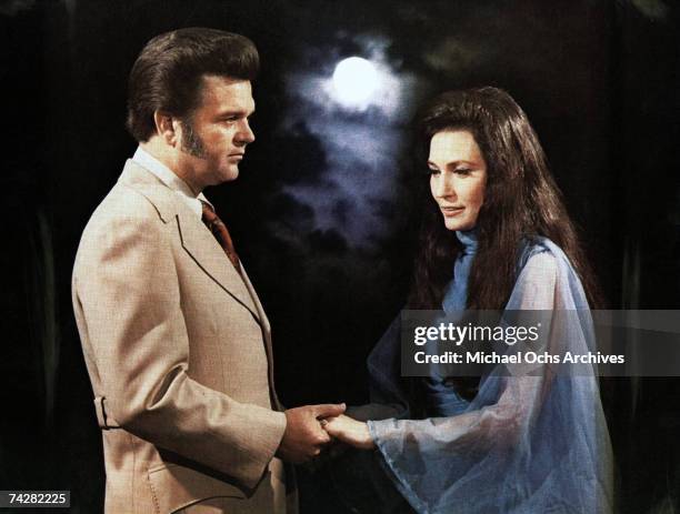 Loretta Lynn and Conway Twitty pose for a portrait in circa 1979.