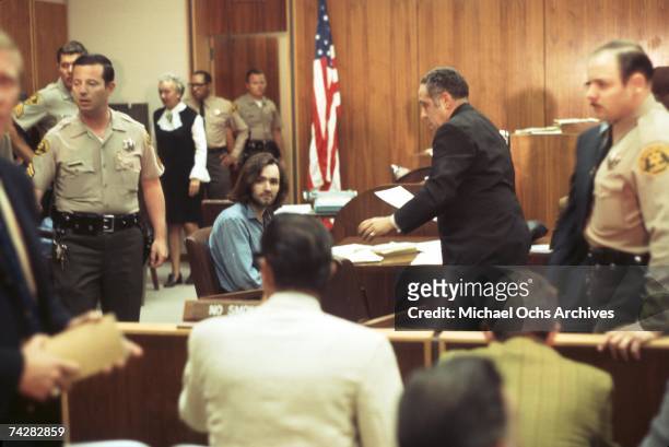 American criminal and cult leader Charles Manson sits at the defendant's table at the Santa Monica Courthouse for a hearing regarding the murder of...