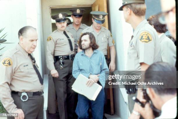 American criminal and cult leader Charles Manson is escorted by Los Angeles County sheriffs to a police van to the Santa Monica Courthouse to appear...