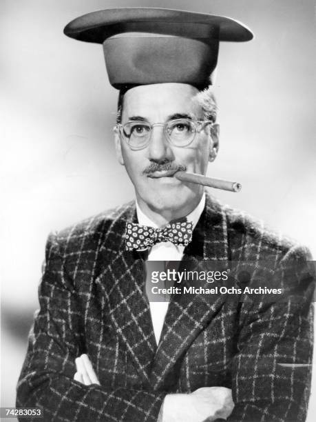Film legend and later radio and TV game show host Groucho Marx poses for a portrait to promote 'You Bet your Life' circa 1950 in Los Angeles,...