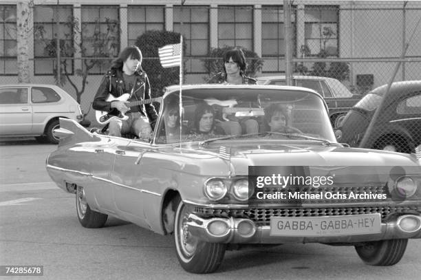 Left to right Johnny Ramone, Joey Ramone , Marky Ramone , Dee Dee Ramone , and driver Rodney Bingenheimer punk group The Ramones rides in a vintage...