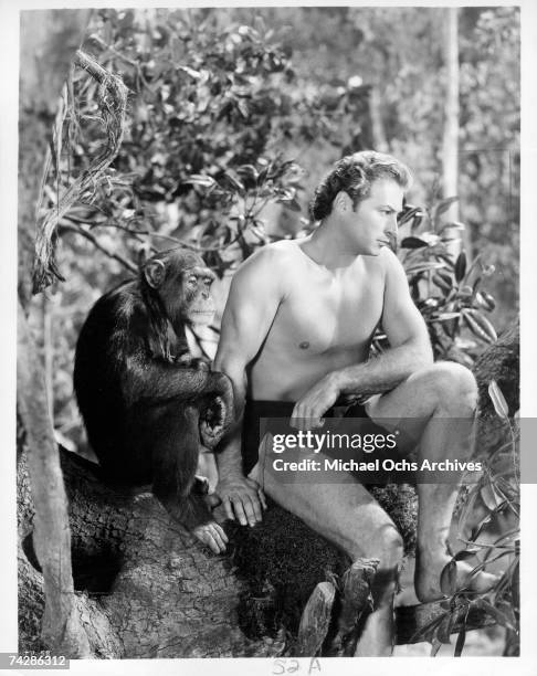 Actor Lex Barker as Tarzan, with a chimpanzee. Photo by Michael Ochs Archives/Getty Images