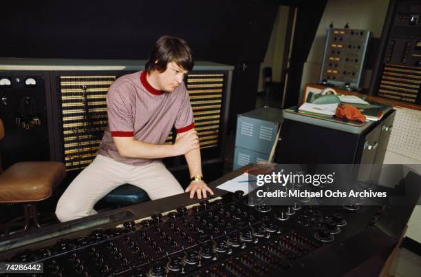 Singer and mastermind Brian Wilson of the rock and roll band "The Beach Boys" directs from the control room while recording the album "Pet Sounds" in...