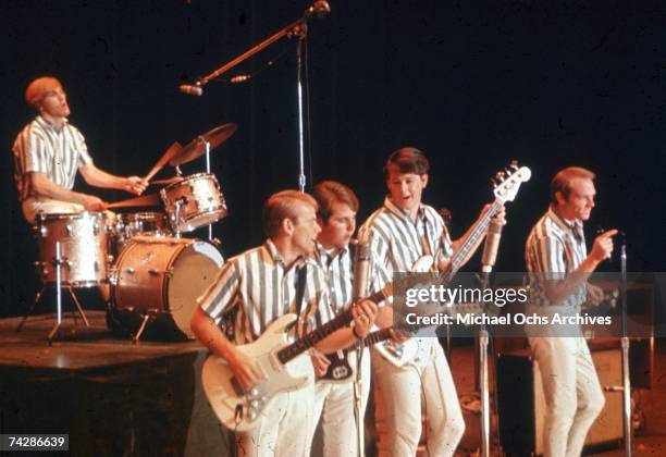 Rock and roll band "The Beach Boys" perform onstage in circa 1964 in California. Dennis Wilson, Al Jardine, Carl Wilson, Brian Wilson, Mike Love.