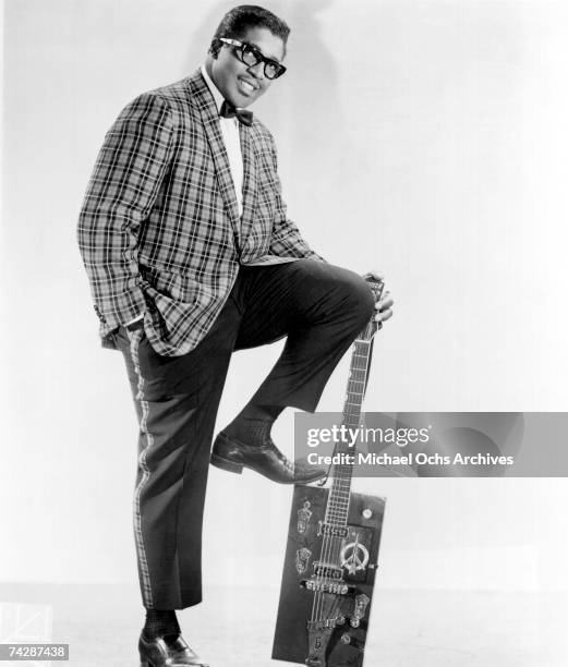 Bo Diddley poses for a portrait with his trademark square Gretsch electric guitar in circa 1957 in New York City, New York.