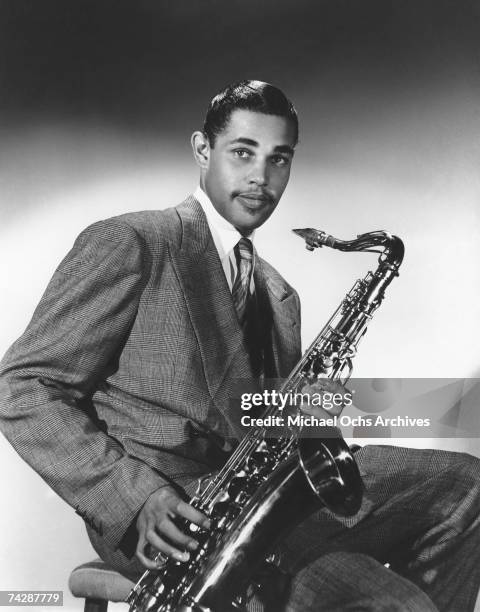 Musician Dexter Gordon poses for a portrait with his saxophone on July 12, 1947 in Los Angeles, California.