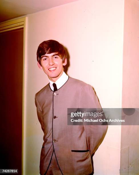 Guitarist George Harrison of the rock and roll band "The Beatles" poses for a portrait in 1964 in London, England.
