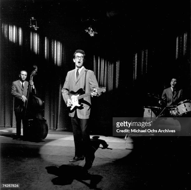 Buddy Holly & The Crickets L-R: Joe Mauldin, Buddy Holly, Jerry Allison perform on the Ed Sullivan Show at the Ed Sullivan Theatre on January 26,...