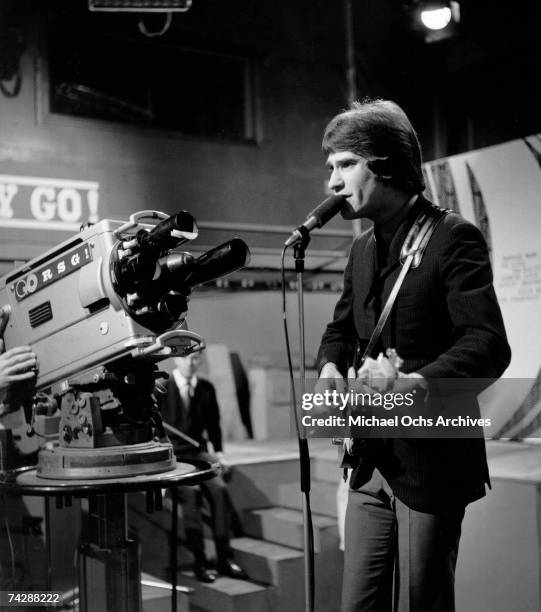 Singer and guitarist Ray Davies of the rock group "The Kinks" performs on the "Ready, Steady, Go" Television show June 24, 1966 in London, England.