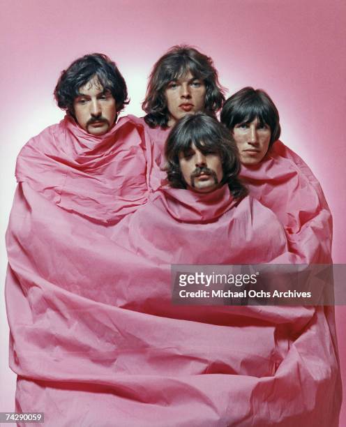 Psychedelic rock group Pink Floyd pose for a portrait shrouded in pink in August of 1968 in Los Angeles. Nick Mason, Dave Gilmour, Rick Wright ,...