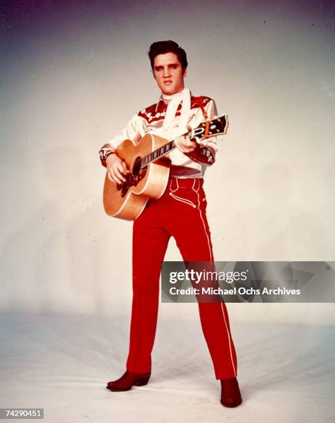 Rock and roll singer Elvis Presley poses for a portrait to publicize the release of his movie "Loving You" in February of 1957 in Los Angeles, CA.
