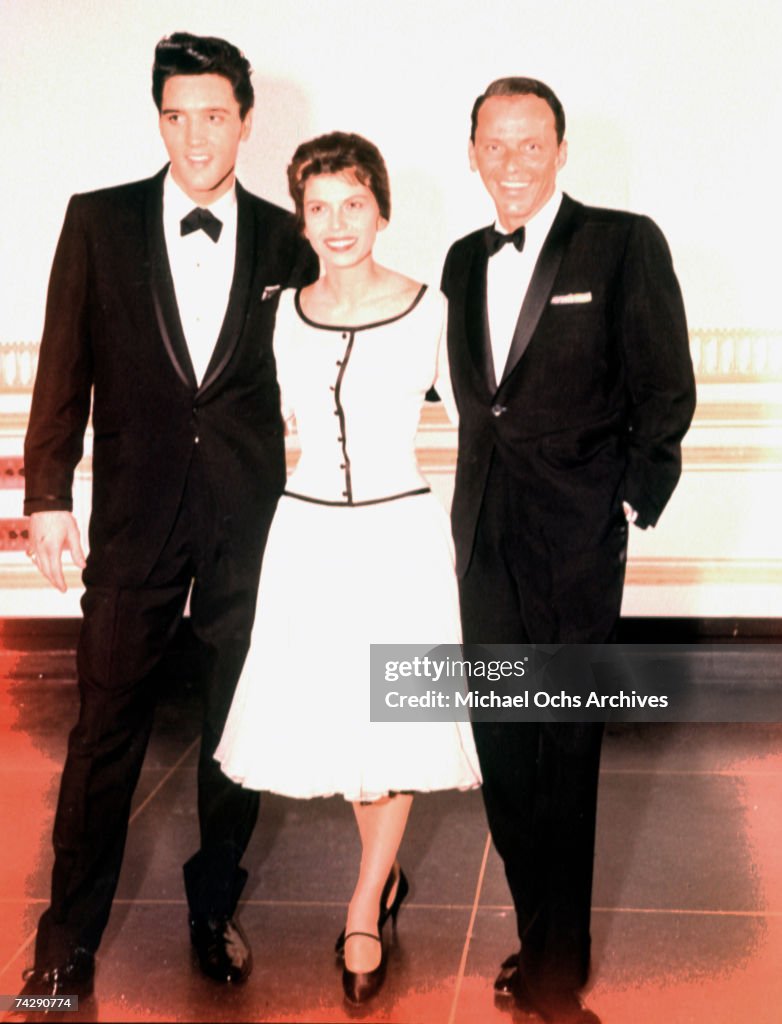 Elvis Presley with Frank Sinatra and a woman
