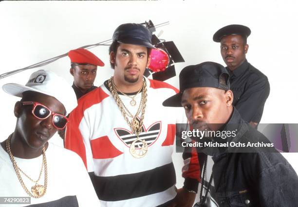 Flavor Flav, Professor Griff, Terminator X, S1W and Chuck D of the rap group Public Enemy pose for a portrait in a studio.