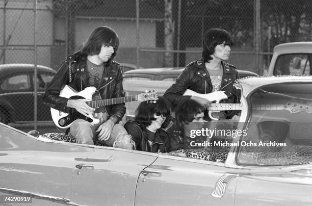 Left to right Johnny Ramone, Joey Ramone , Marky Ramone , Dee Dee Ramone , and driver Rodney Bingenheimer punk group The Ramones rides in a vintage...